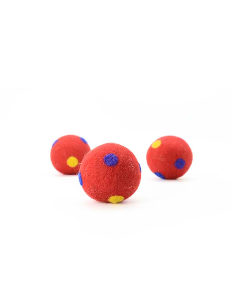 3cm red felt balls with cheerful polka dots, ideal for gifting, decorating, or playful sensory exploration.