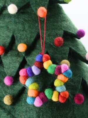 Cuddly felt pom-poms dance across this cheerful handmade star tree decoration, adding whimsy to your holiday cheer.